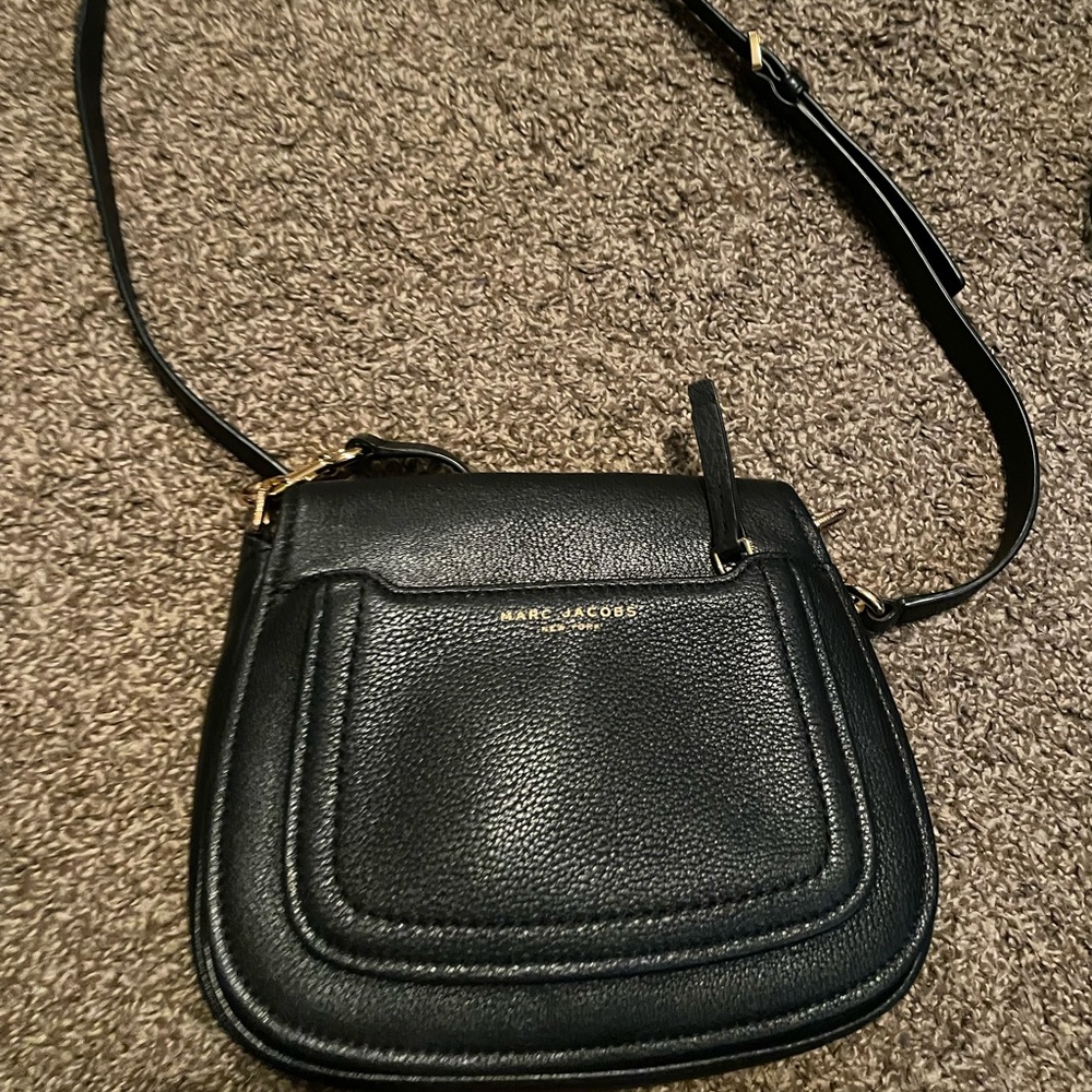 Marc Jacob’s Black leather messenger bag. Crossbody